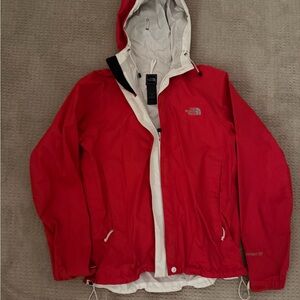 The North Face Red windbreaker woman’s